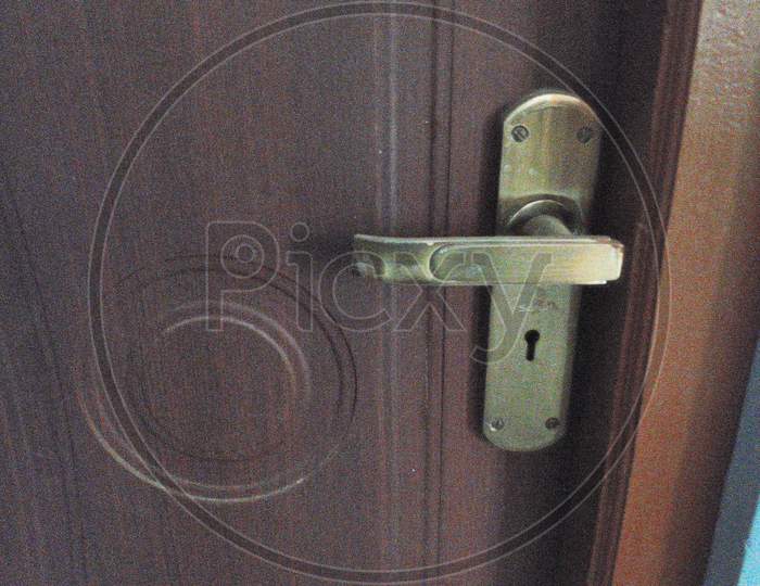 Handle on wooden door