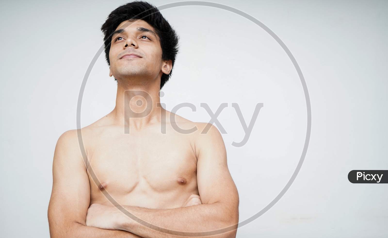 Motivating And Smart. Portrait Of Young Indian Boy Looking Upwards