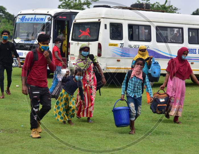 Migrant  After Arriving From Chennai Via Shramik Special Train  At  A Health Screening  Center  For Swab Sample  Test During Nationwide Lockdown Amidst Coronavirus or COVID-19 Pandemic  In Nagaon District Of Assam,India