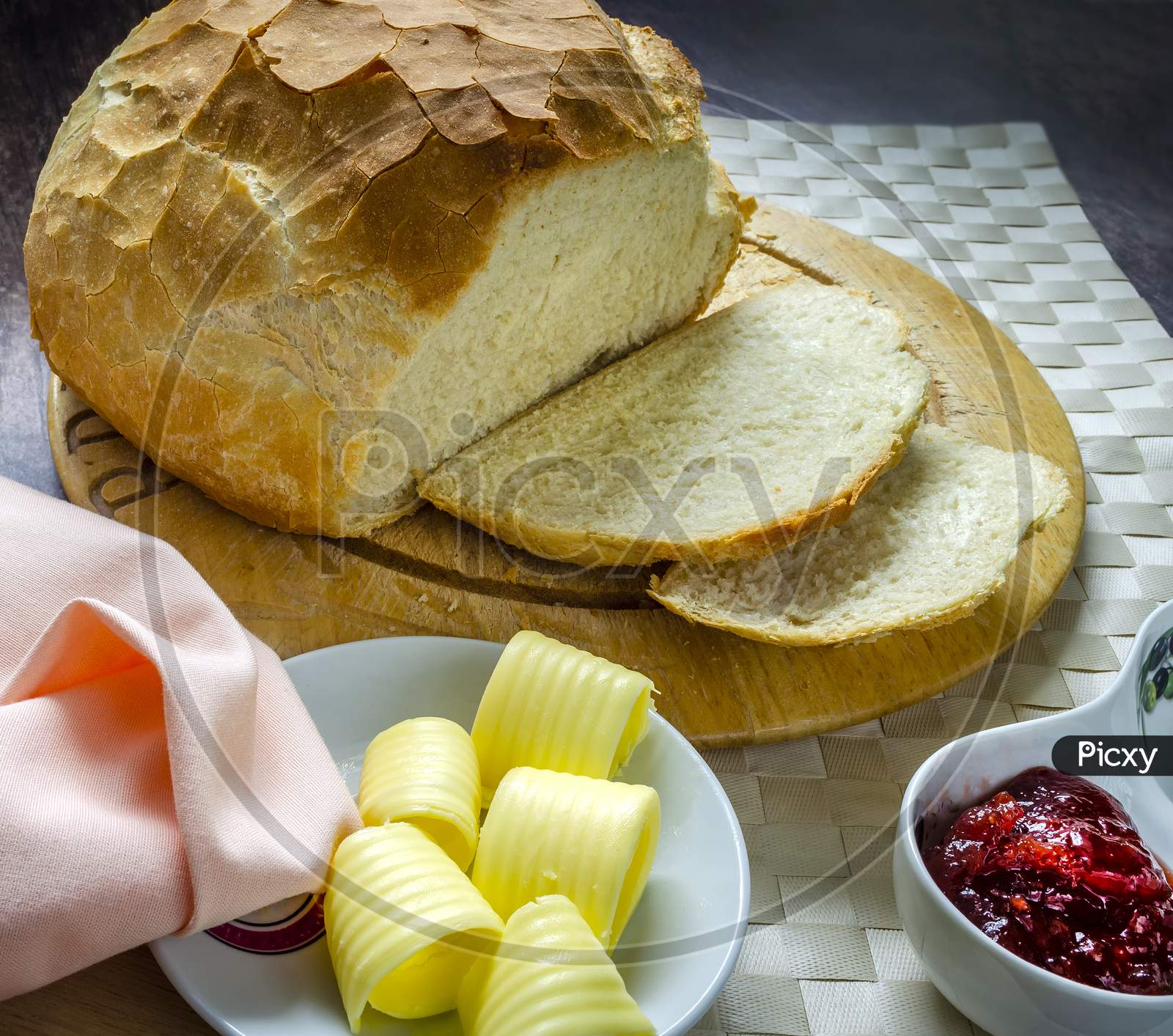 Home made bread with butter and jam