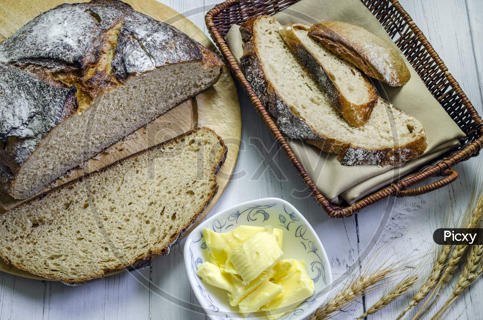 A loaf of freshly baked rye bread sliced