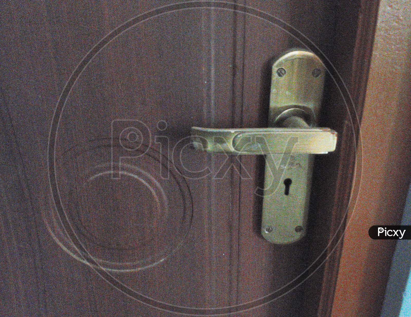 Handle on wooden door