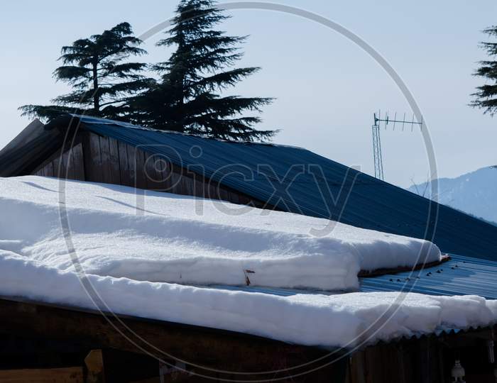 Roof covered with the snow at Patnitop a city of Jammu, Winter landscape