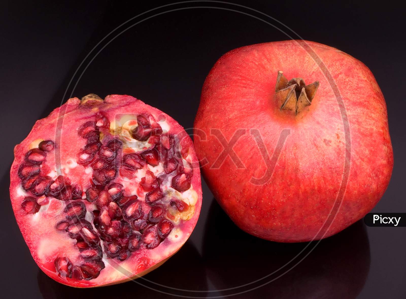 Pomegranate and half cut open