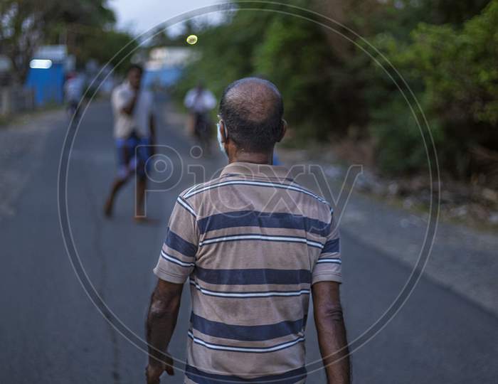 A man Walking in streets of chennai during corona virus pandemic