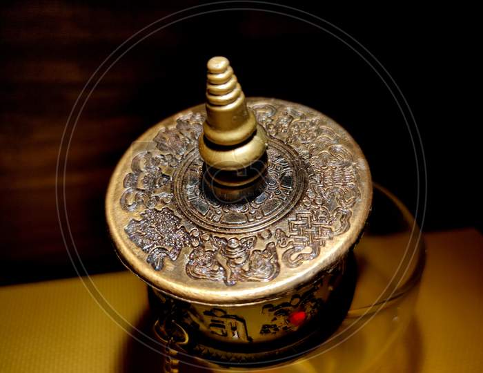 Close Up Image Of Tibetan Buddhism Prayer Wheel.