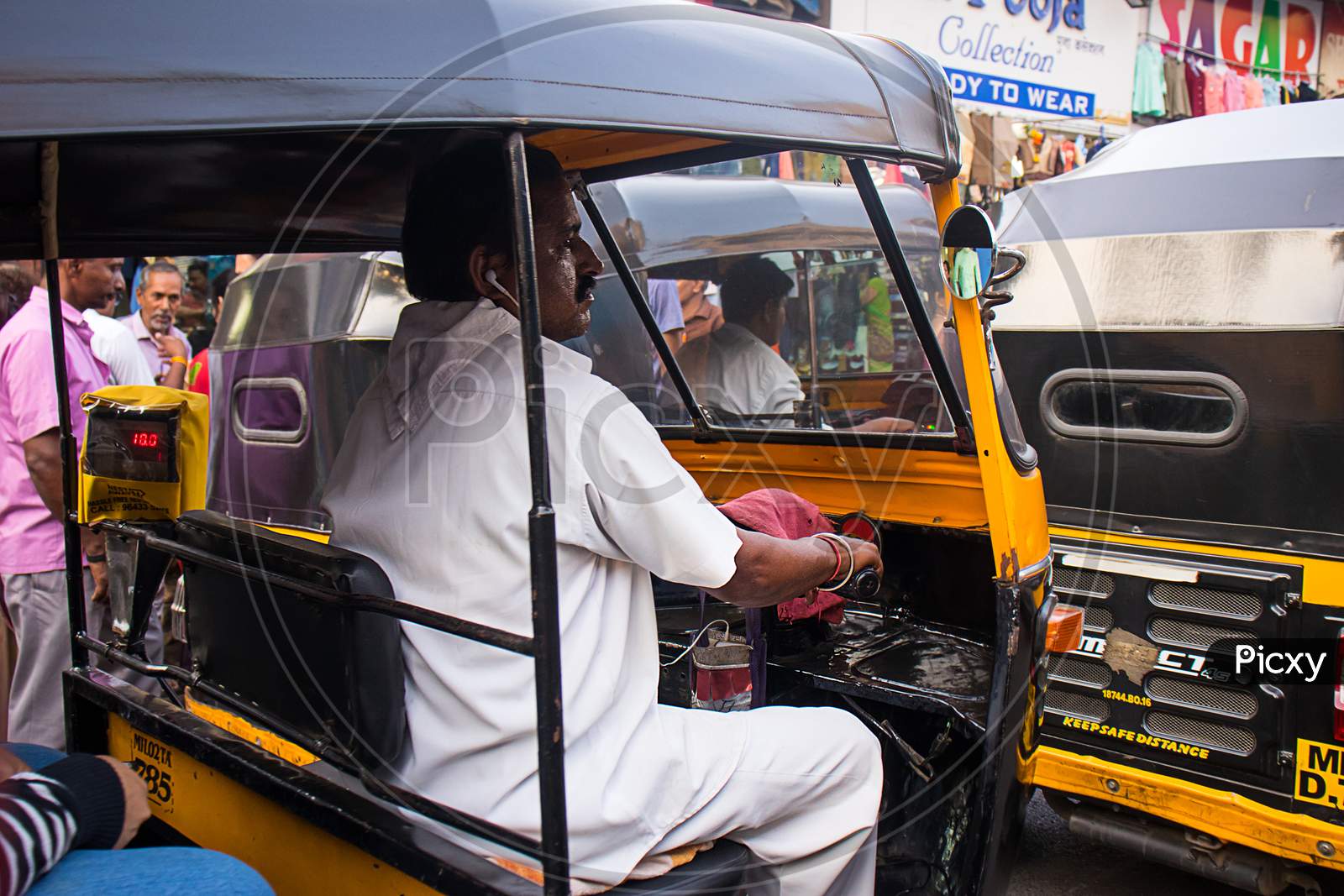Mumbai, Maharashtra, India - June 4Th, 2019 : Indian Man Driver Driving Auto-Rickshaw Taxi - Image