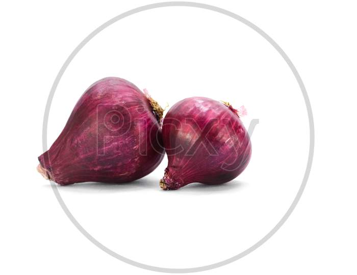 Red whole onions isolated on white background
