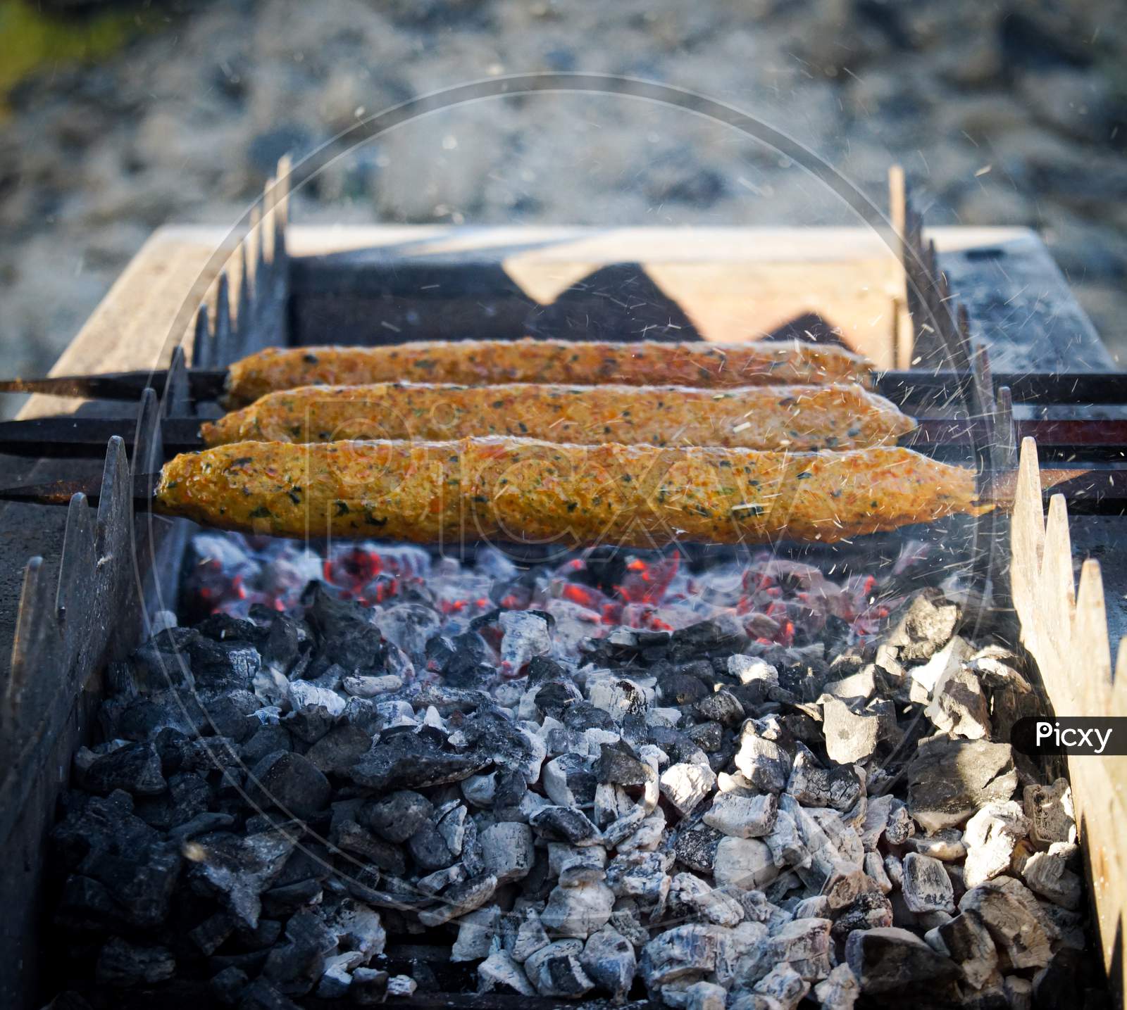 Seekh kebab on grill, top view