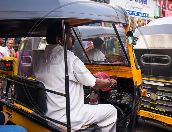 Mumbai, Maharashtra, India - June 4Th, 2019 : Indian Man Driver Driving Auto-Rickshaw Taxi - Image