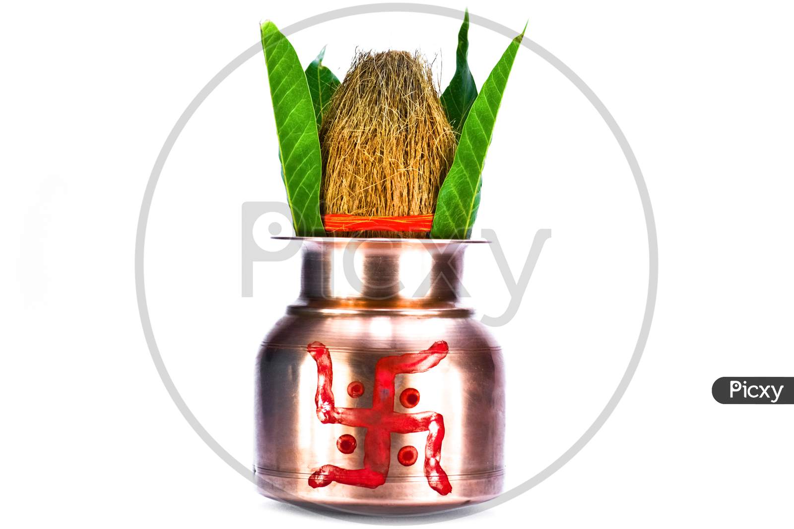 Copper kalash with coconut and mango leaf isolated on white background