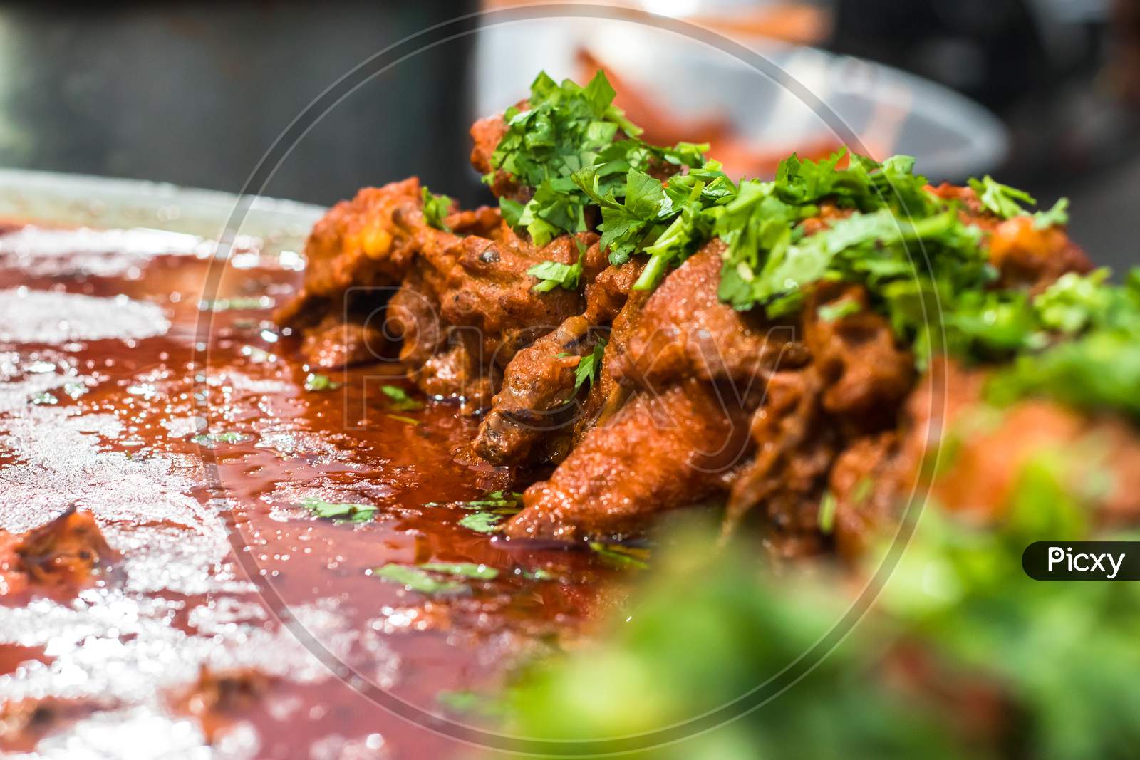Indian Style Roasted Chicken Or Tandoori Chicken Garnished With Mint Leaves . Indian Non Vegetarian Food. - Imageindian Style Roasted Chicken Or Tandoori Chicken With Spicy Delicious Gravy, Indian Non Vegetarian Food. - Image