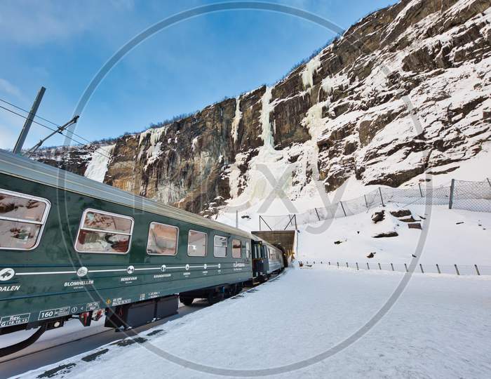 FLAM, NORWAY -  20th Feb, 2018: The train stops at the flam station. The Flam Line is between Myrdal and Flam in Aurland, Norway, the mainline of the Bergen Line.