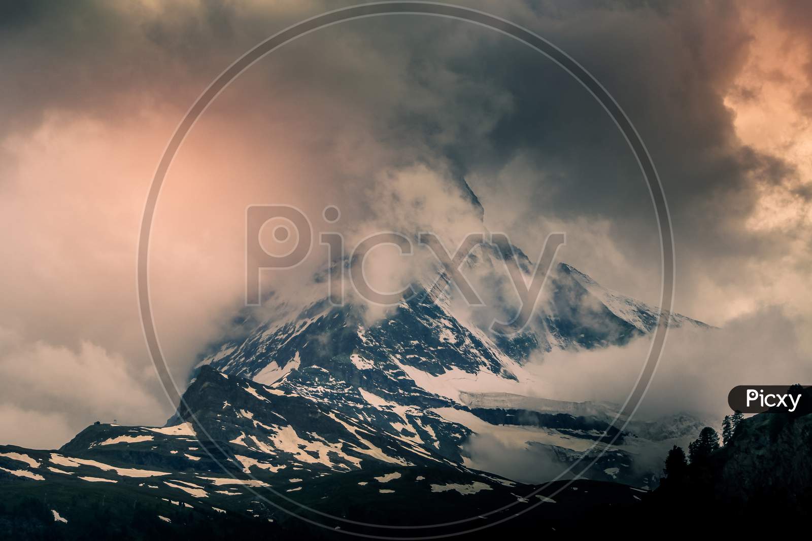 The Matterhorn Mountain Of The Alps Covered With Clouds, Zermatt Switzerland