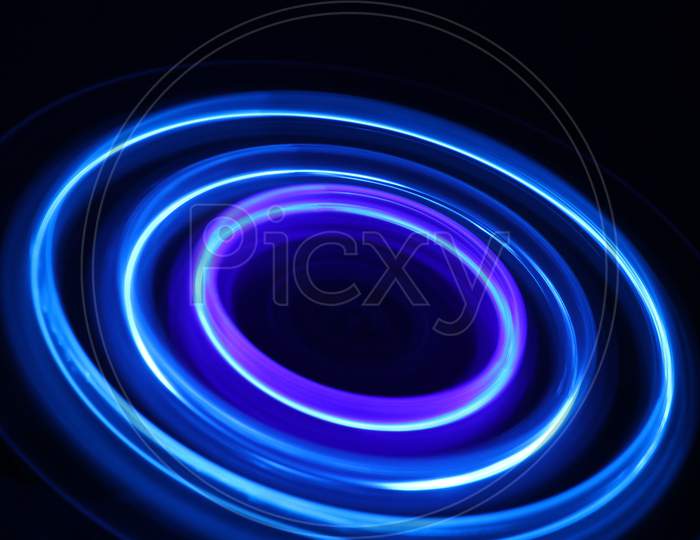 Circular Blue Pattern Formed By Spinning Led Bulbs