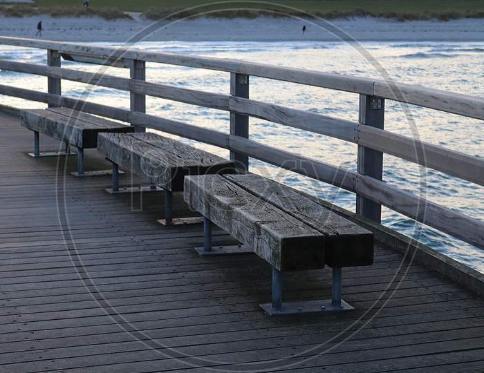 wooden seats near the baltic sea
