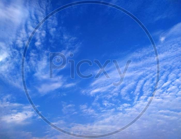 white cloud flying in blue sky