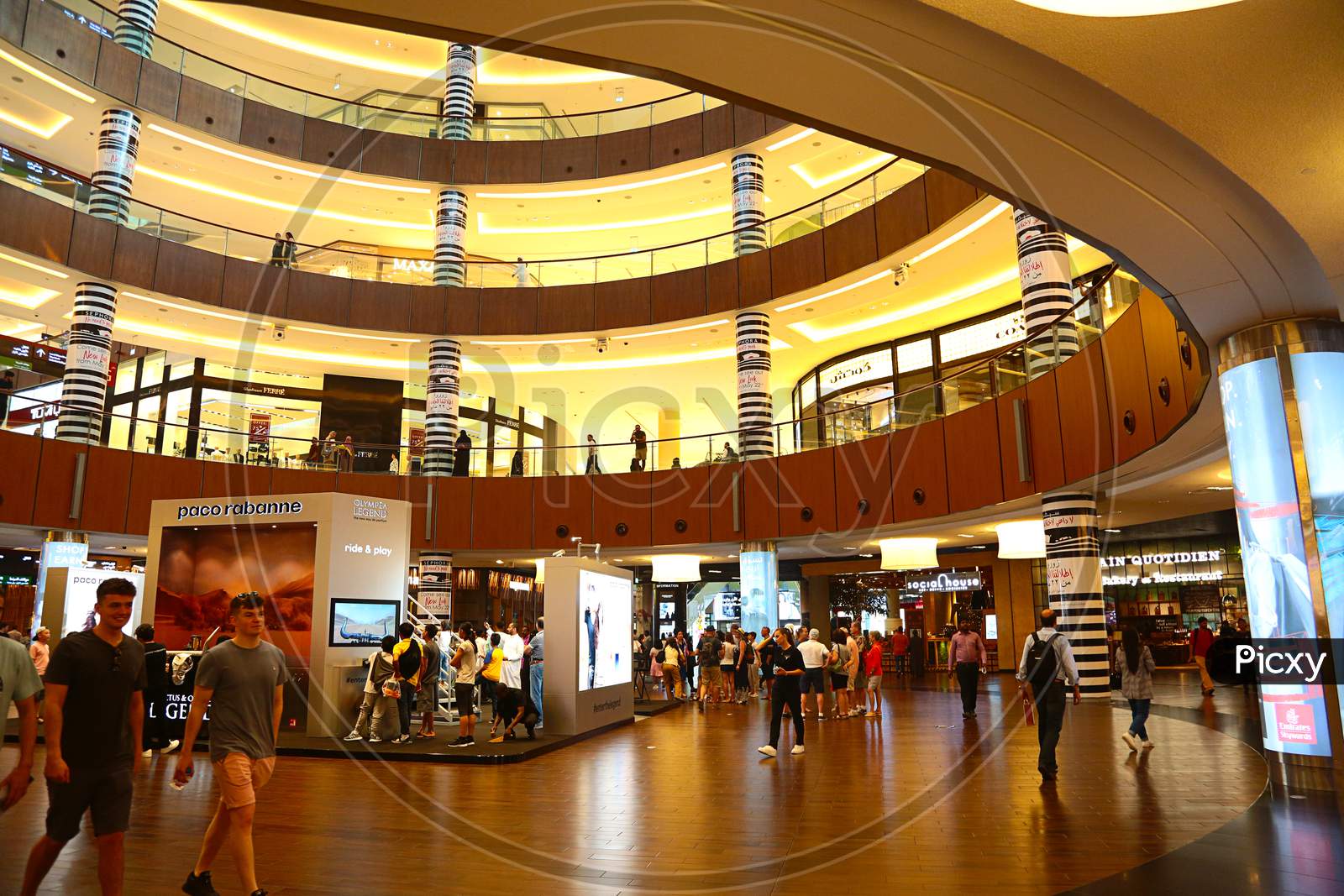 Dubai, United Arab Emirates - June 18Th, 2019: The Dubai Mall Inside View With People All Around Walking And Shopping - Image