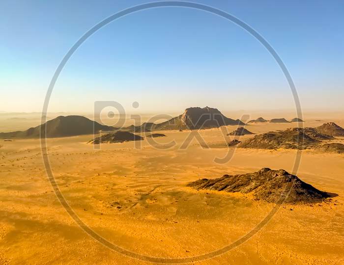 Mountain Range In Sahara Desert. Bird's eye view.