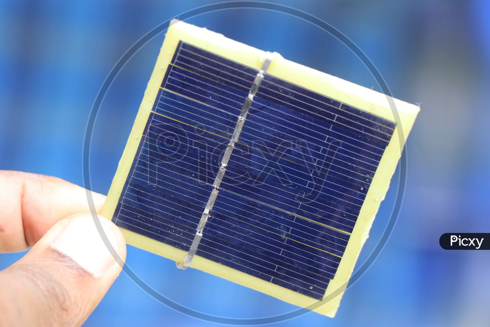 Solar Panel Made Of Silicon Which Is Small Held In Hand