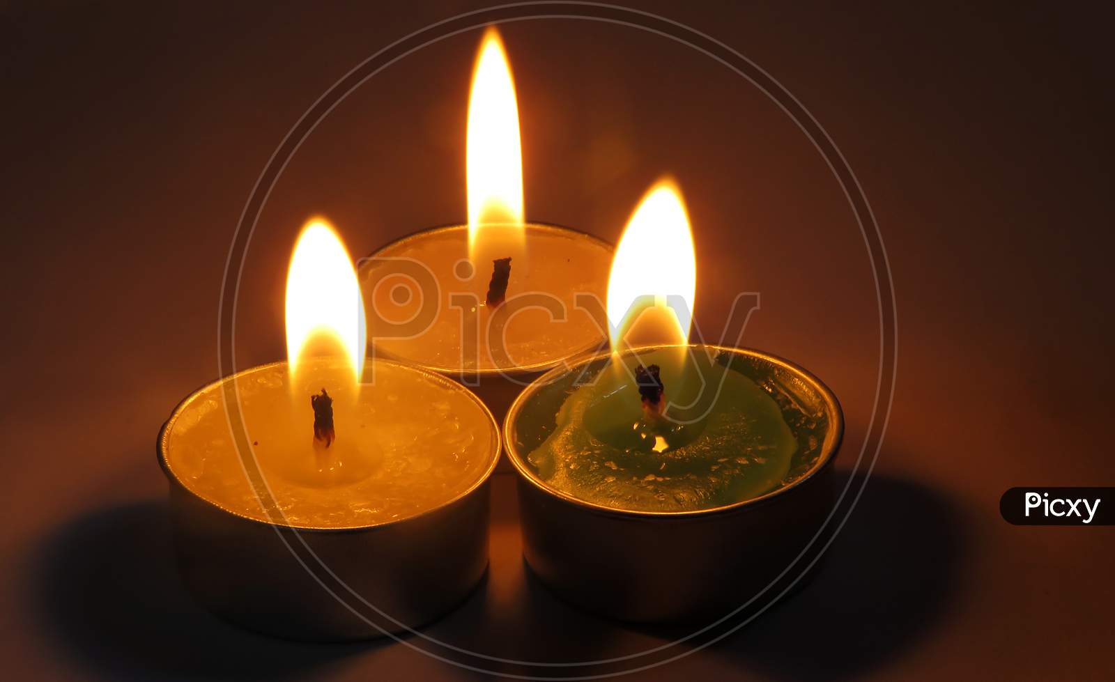 Burning candle on black,Isolated Burning Candles.Temple Candles.Burning candle flame,