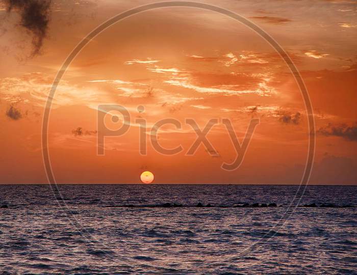 Beautiful Sunset Over Sky On Sea in Maldives