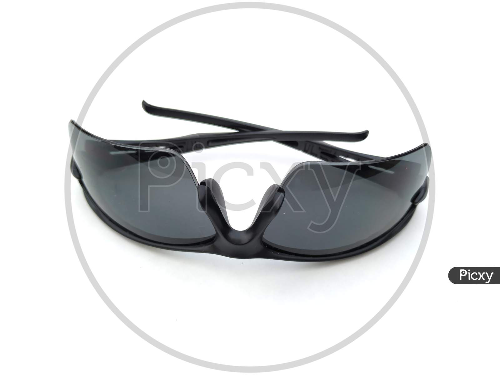 Stylish unisex sunglasses on a white background. Front view.