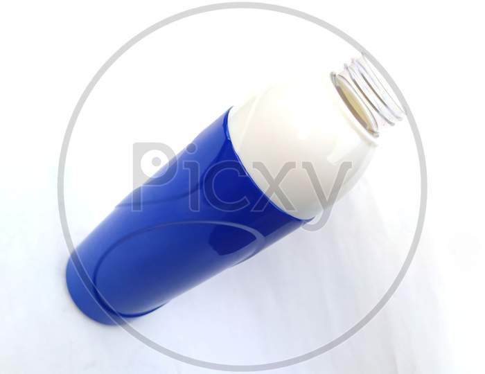 blue and white cold water bottle isolated on white background