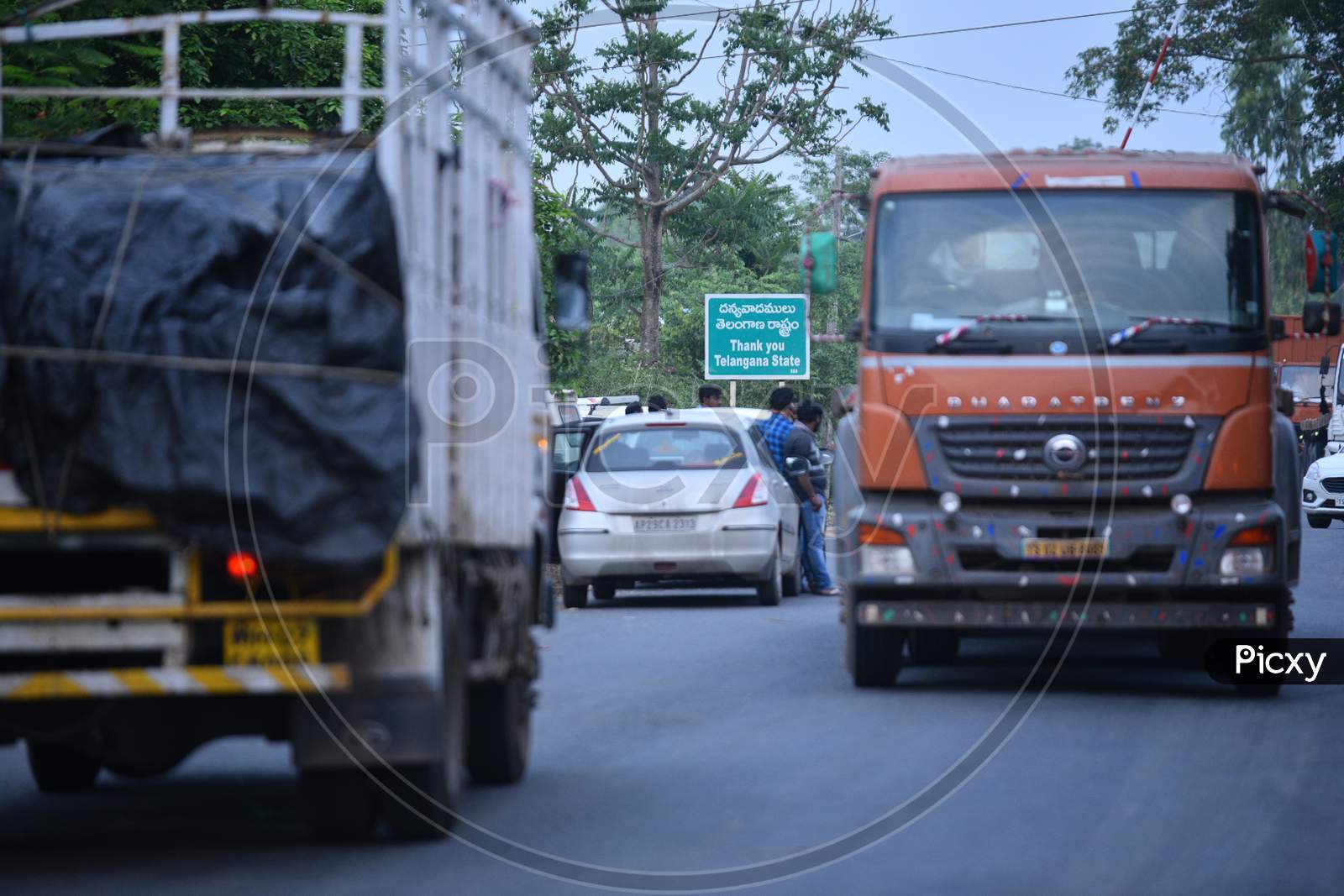 Heavy Trucks Carrying Industrial Goods Waiting At Telangana- Andhra Pradesh Border For Clearance During Nationwide Lockdown Amidst Coronavirus Or COVID-19 Pandemic In Aswaraopeta, Telangana