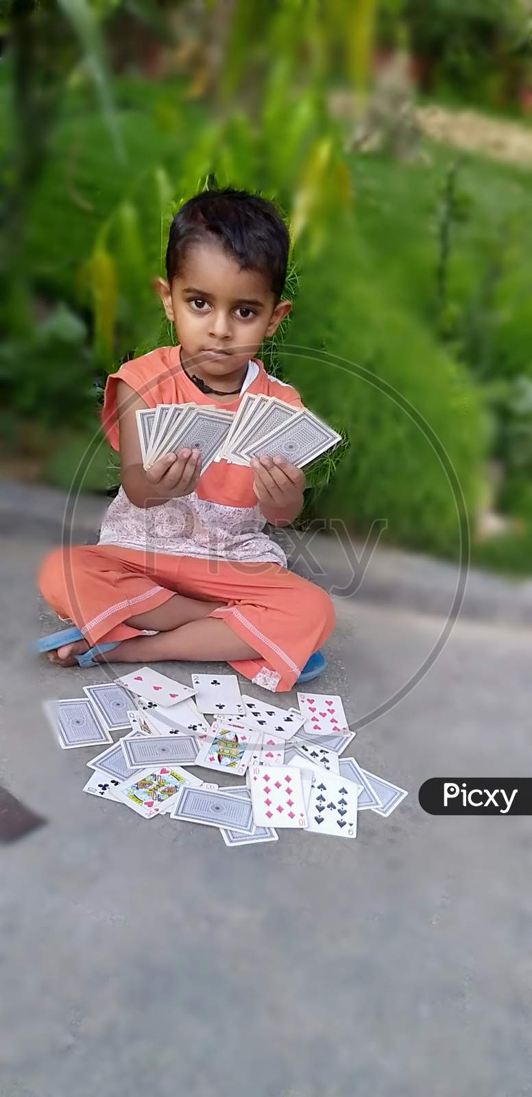 A baby people played by CARDS in downs