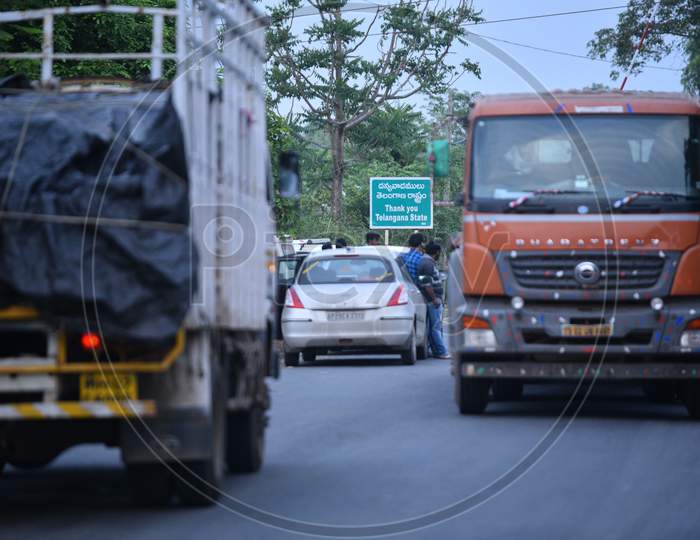 Heavy Trucks Carrying Industrial Goods Waiting At Telangana- Andhra Pradesh Border For Clearance During Nationwide Lockdown Amidst Coronavirus Or COVID-19 Pandemic In Aswaraopeta, Telangana