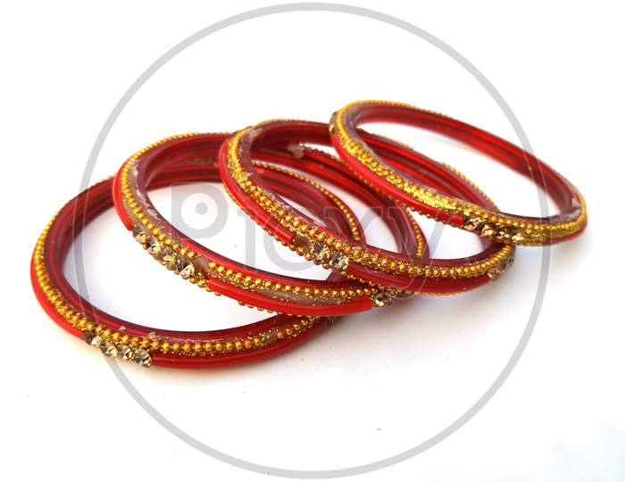 indian traditional bangles isolated on violet background