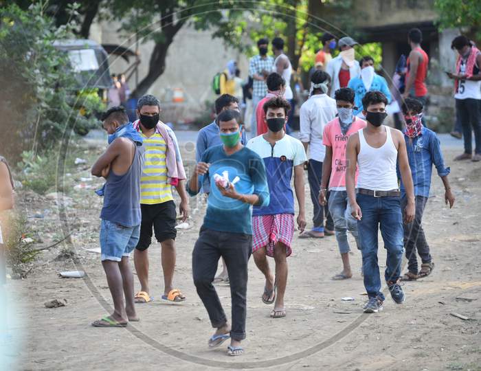 Migrant workers from Odisha, West Bengal and Bihar wait for clearance at Telangana-Andhra Pradesh Border to move to their hometowns , Aswaraopet, Telangana, May 16,2020