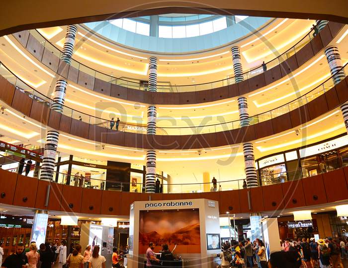 Dubai, United Arab Emirates - June 18Th, 2019: Inside View Of The Dubai Mall With People All Around Walking And Shopping - Image