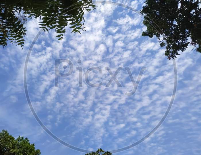 Blue sky white clouds natural view at mid day
