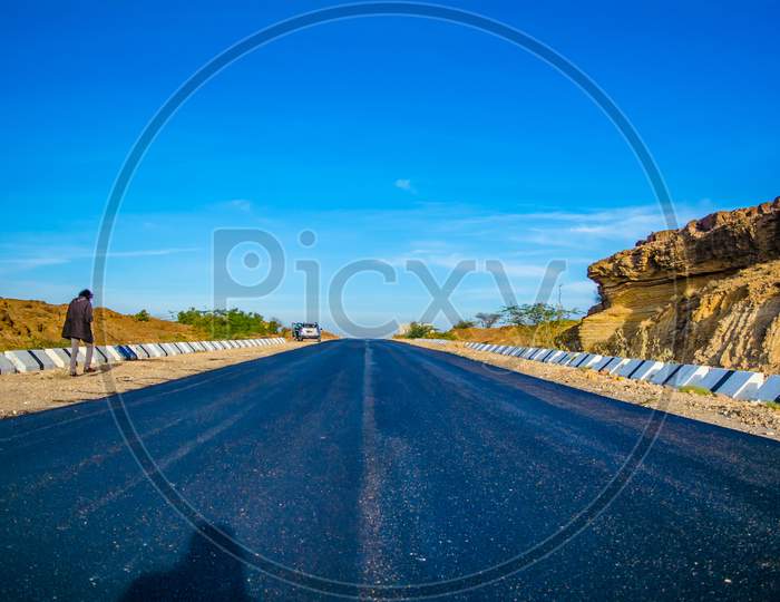 Highway, path, road in Desert of Rajasthan, India, Road passing through a landscape, Jaisalmer, Rajasthan