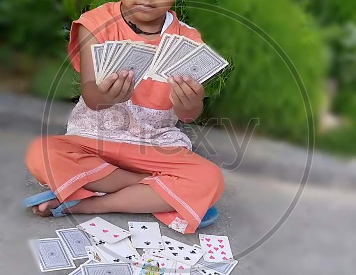 A baby people played by CARDS in downs