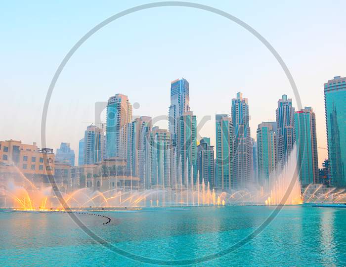 Dubai, United Arab Emirates - June 18Th, 2019: Dubai Dancing Fountain Evening Show Near Burj Khalifa Lake - Image