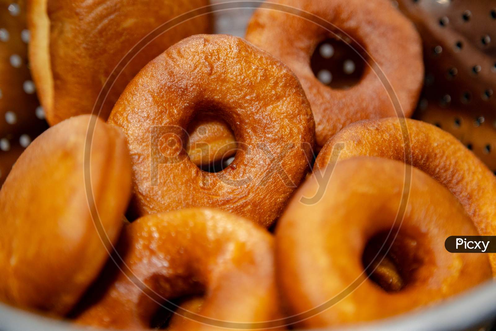 Fresh, Golden Brown And Homely Cooked Donuts. Focused And Defocused Donuts