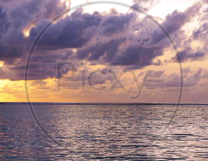 Beautiful Sunset Over Sky On Sea in Maldives