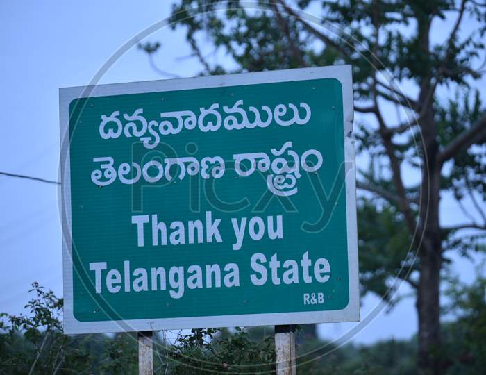 A signboard is pictured at the Telangana State-Andhra Pradesh border During Nationwide Lockdown Amidst Coronavirus Or COVID-19 Pandemic in Aswaraopeta, Telangana