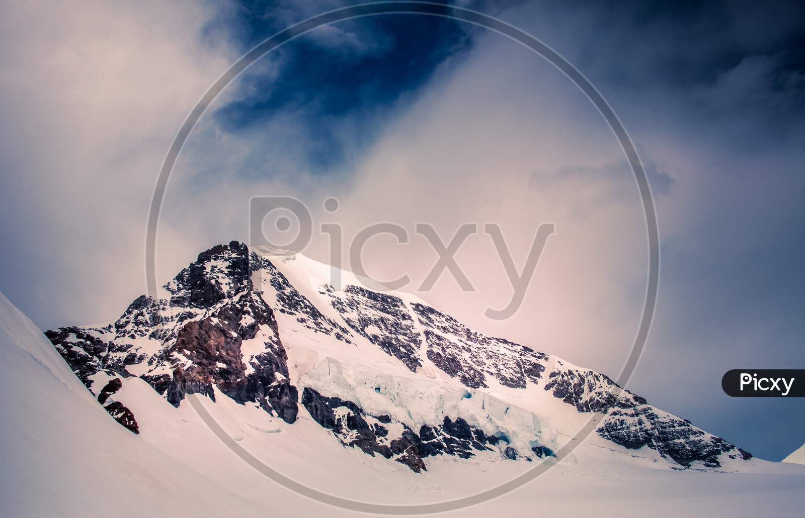 Jungfraujoch, Top Of Europe - The Swiss Mountain Experience. A Beautiful Peak Snow Mountain View