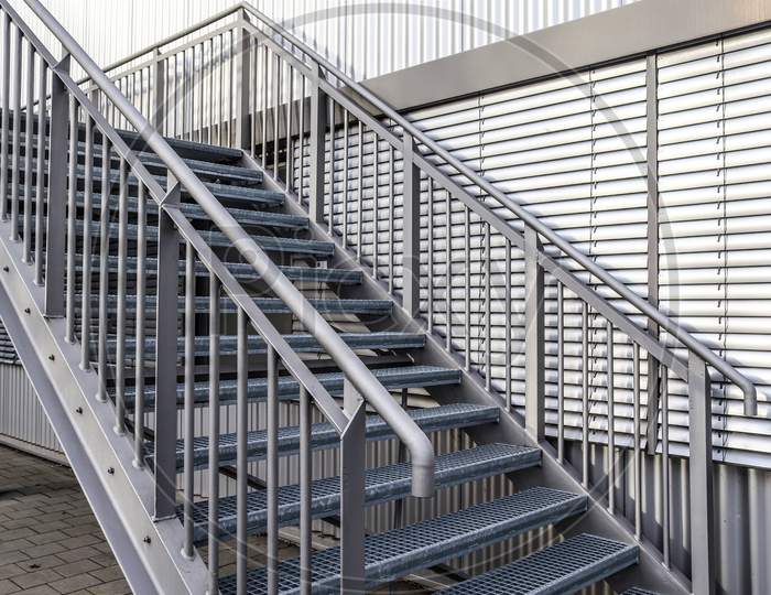 Different outdoor views on concrete, wooden and metal stairways