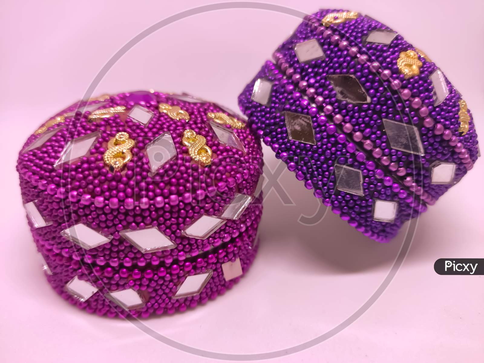 Close View Of Moroccan Jewelry Boxes In White Background.