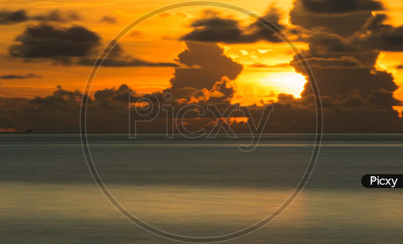 Beautiful Sunset Over Sky On Sea in Maldives  With Horizon