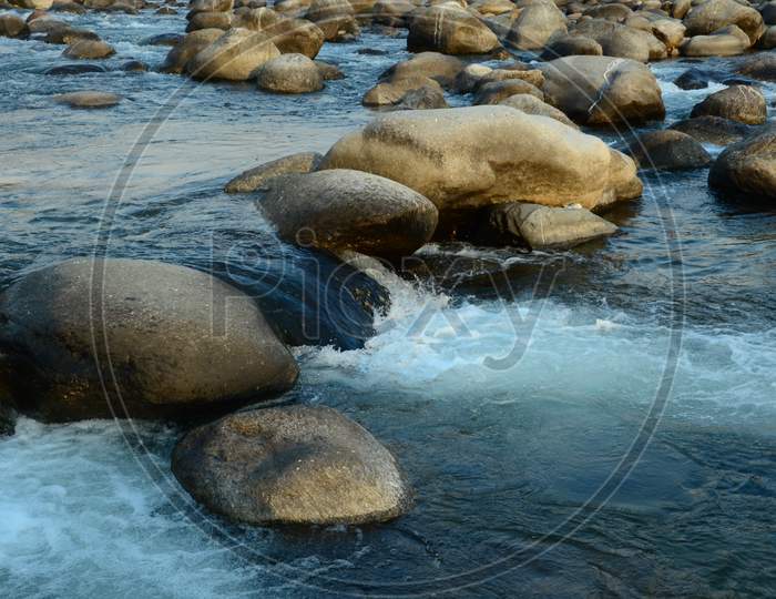 Stone in River Flowing Water HP India
