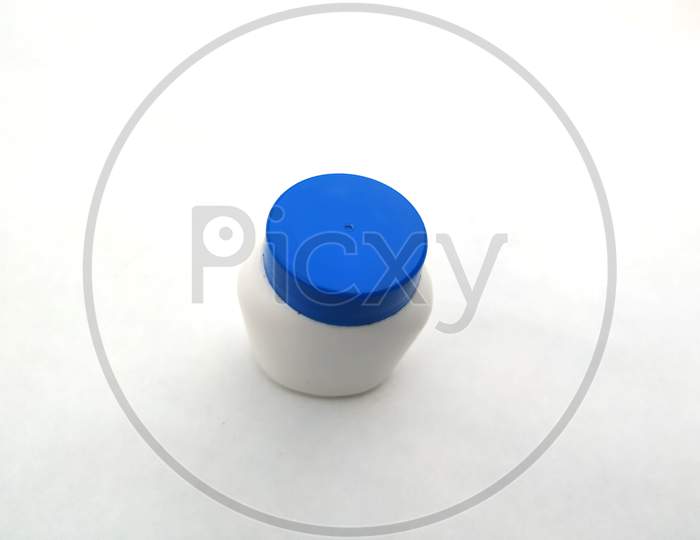 round plastic jar for cosmetics cream isolated on white background