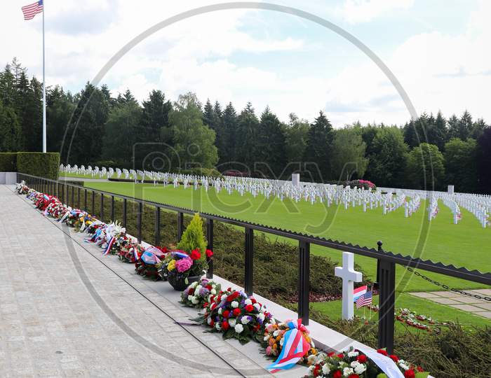 Row Of Wreaths At A Military Cemetery