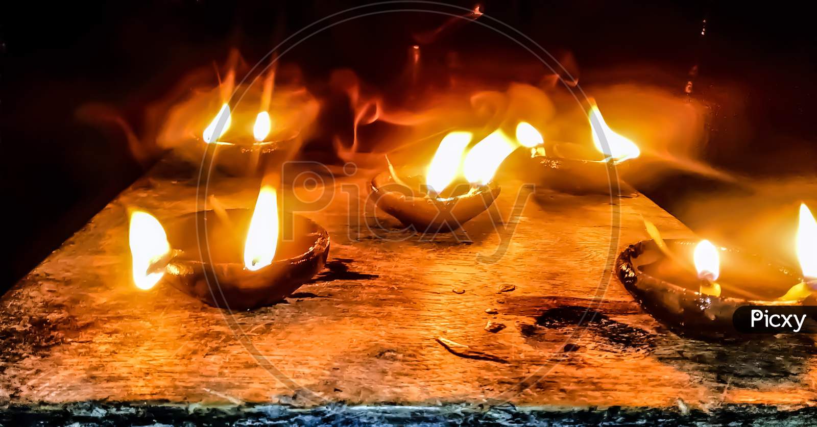Colourful, luminous sparking Diwali lamps