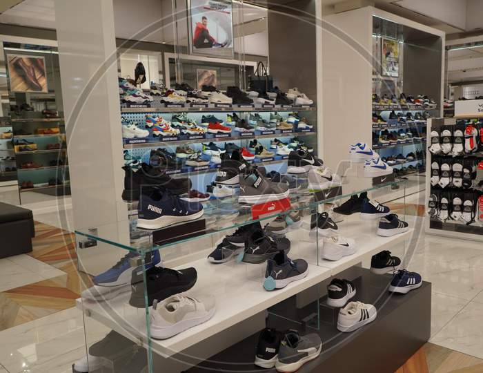 Dubai Uae December 2019 Puma Brand Sport Shoes At A Shop. Footwear Of Various Brands In The Mall. Big Collection Of Different Sport Shoes.